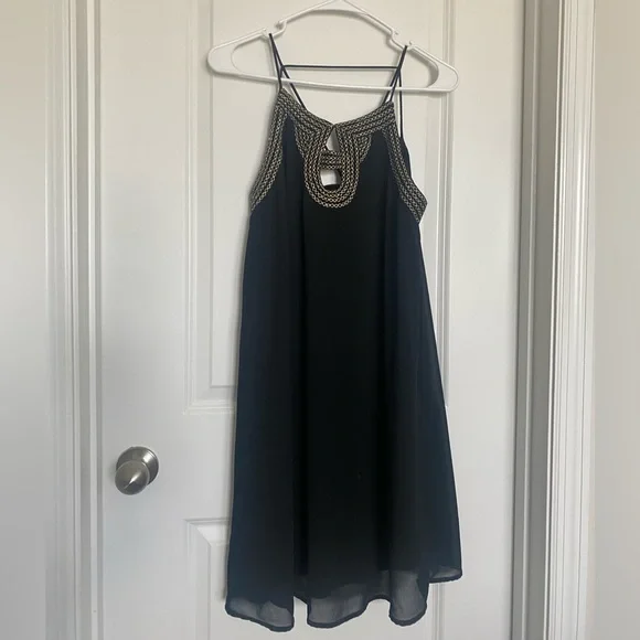 black and gold swing dress V Neckline Black and Gold Print Swing Dress | Crosena main image 0